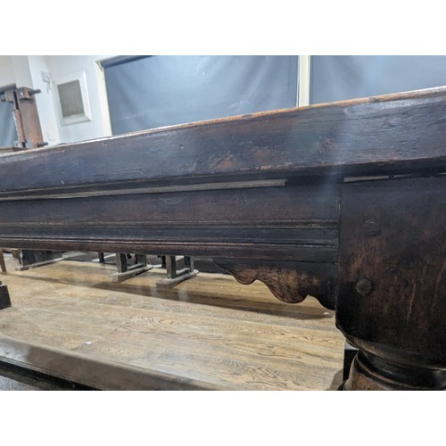 641 - A large oak Victorian double church Pew, decorated with carvings and scrolls, constructed from two s... 