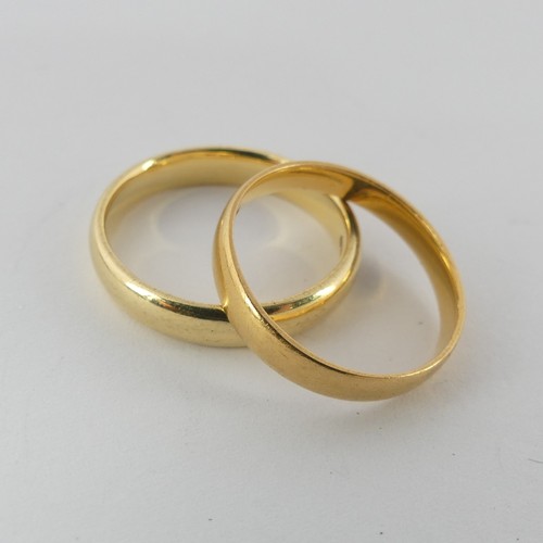 353 - An 18ct yellow gold Band, Size N, 4.2g, together with a 22ct gold Band, Size L, 2.4g (2)... 