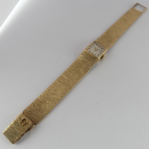 204 - A 9ct yellow gold lady's Omega Wristwatch, signed square dial with baton markers, with cal. 485 17-j... 