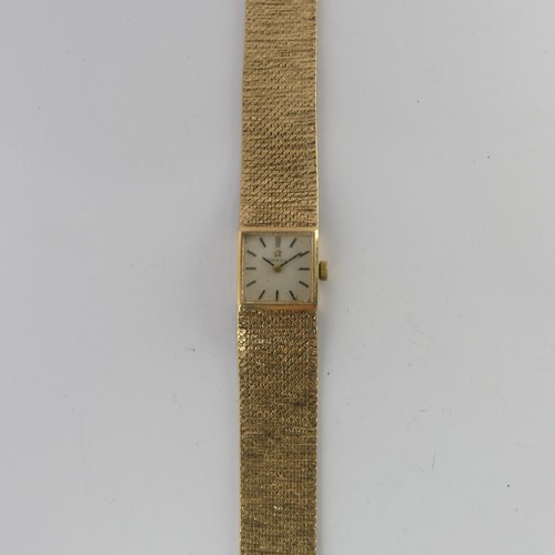 204 - A 9ct yellow gold lady's Omega Wristwatch, signed square dial with baton markers, with cal. 485 17-j... 