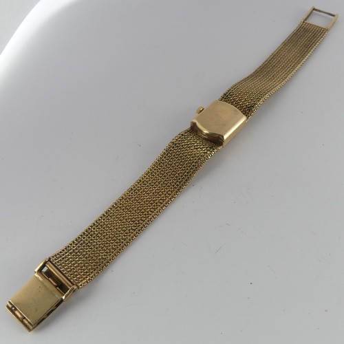 204 - A 9ct yellow gold lady's Omega Wristwatch, signed square dial with baton markers, with cal. 485 17-j... 