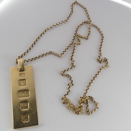 296 - A 9ct yellow gold Ingot Pendant, hallmarked London, 1977, on 9ct gold chain, the chain 62.5cm long, ... 