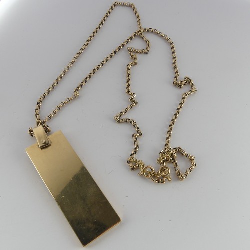 296 - A 9ct yellow gold Ingot Pendant, hallmarked London, 1977, on 9ct gold chain, the chain 62.5cm long, ... 