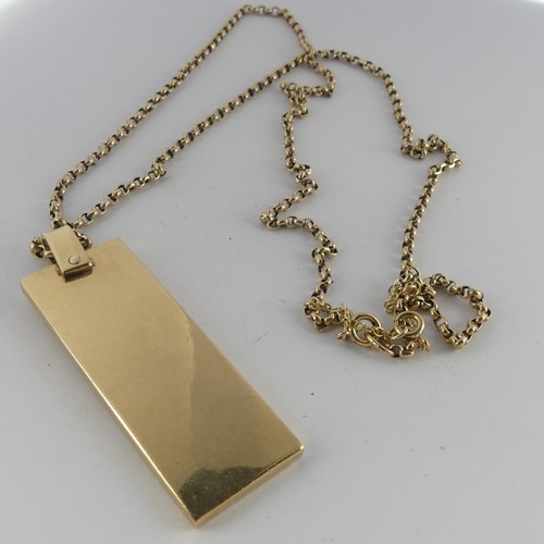 296 - A 9ct yellow gold Ingot Pendant, hallmarked London, 1977, on 9ct gold chain, the chain 62.5cm long, ... 