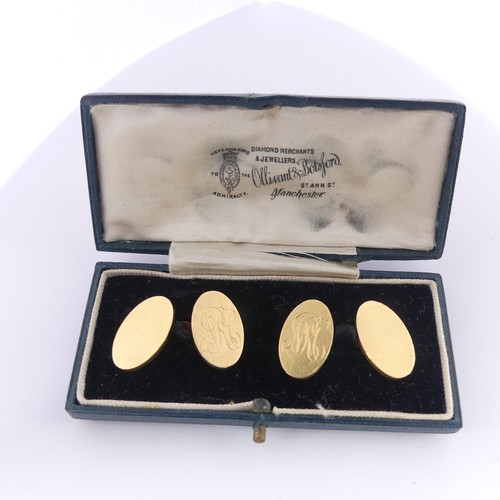 355 - A pair of 18ct yellow gold oval Cufflinks, one side monogrammed, chain between, total weight 20g.... 