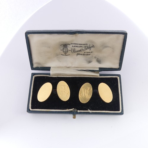 355 - A pair of 18ct yellow gold oval Cufflinks, one side monogrammed, chain between, total weight 20g.... 