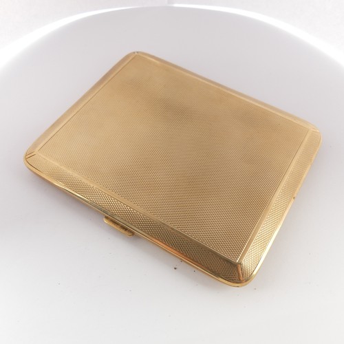 357 - A 9ct yellow gold Cigarette Case,  with engine turned decoration, the interior with inscription, 10.... 