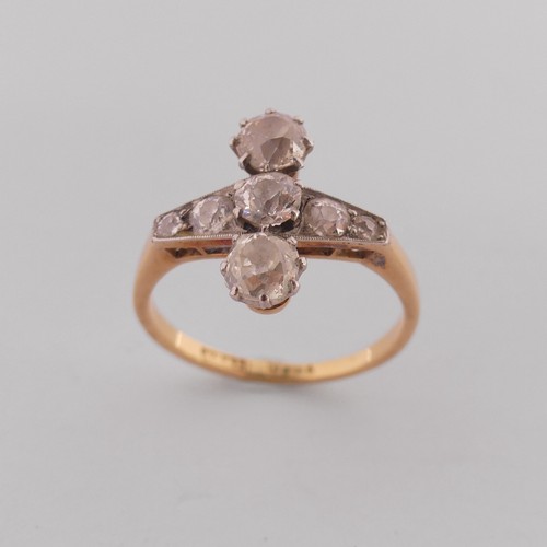 283 - A diamond Ring, the front with a graduated row of five old cut stones, the centre stone approx. 0.25... 