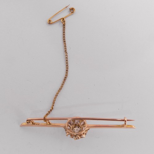 332 - A diamond set Bar Brooch, the centre with an old cut stone approx. 0.6ct, claw set within a cluster ... 