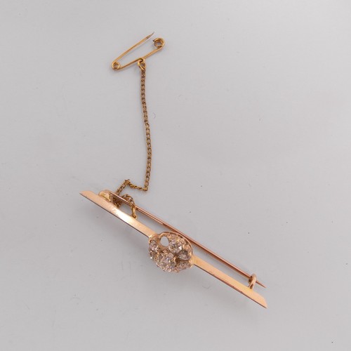 332 - A diamond set Bar Brooch, the centre with an old cut stone approx. 0.6ct, claw set within a cluster ... 