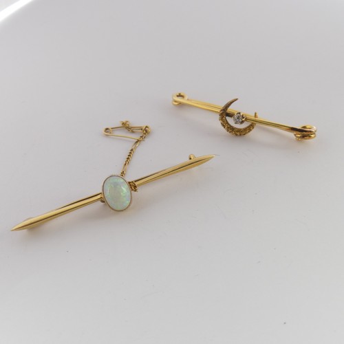 334 - A 15ct yellow gold Bar Brooch, the centre with a cabochon oval opal approx. 8.6mm long, the bar, 5.5... 