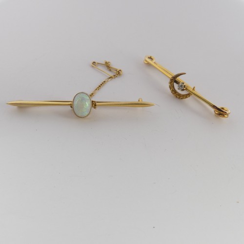 334 - A 15ct yellow gold Bar Brooch, the centre with a cabochon oval opal approx. 8.6mm long, the bar, 5.5... 