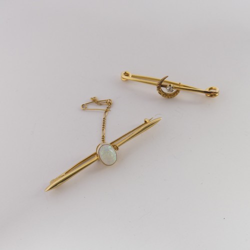 334 - A 15ct yellow gold Bar Brooch, the centre with a cabochon oval opal approx. 8.6mm long, the bar, 5.5... 