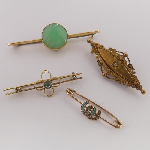 335 - Murrle Bennett; a small 9ct gold Bar Brooch, the centre with entwined horseshoes set seed pearls and... 