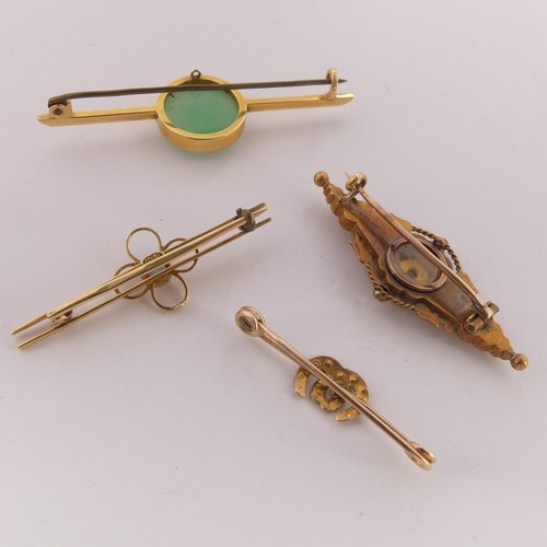 335 - Murrle Bennett; a small 9ct gold Bar Brooch, the centre with entwined horseshoes set seed pearls and... 