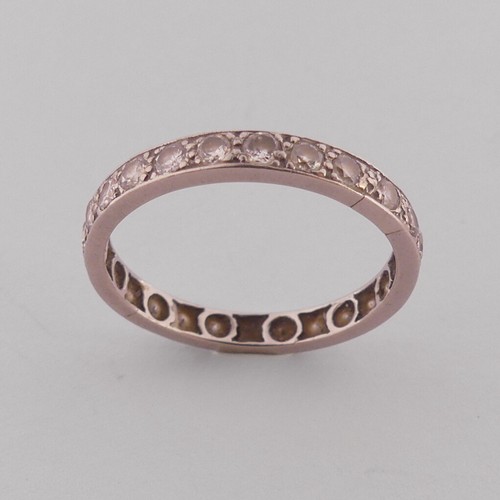 285 - A diamond full Eternity Ring, with twenty five old cut diamonds, all mounted in unmarked white metal... 