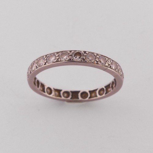 285 - A diamond full Eternity Ring, with twenty five old cut diamonds, all mounted in unmarked white metal... 