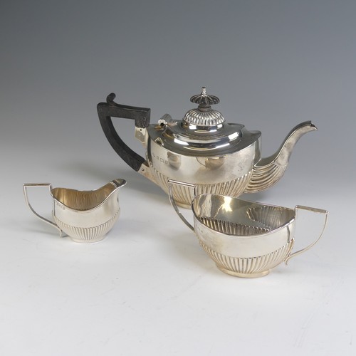 20 - A matched late Victorian silver three piece bachelor's Tea Set, the teapot by Williams Ltd., hallmar... 