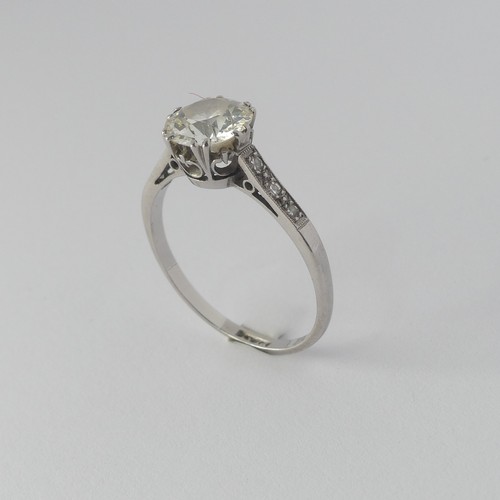 286 - A diamond solitaire Ring, the circular stone approx. 1.3ct (7.3mm x 4.04mm) claw set with three mill... 