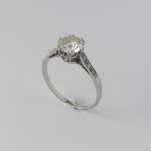 286 - A diamond solitaire Ring, the circular stone approx. 1.3ct (7.3mm x 4.04mm) claw set with three mill... 