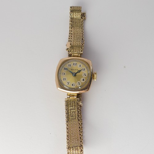 210 - A 1930's 9ct gold Rolex lady's Wristwatch, the signed gilt dial with Arabic Numerals, with a 15-jewe... 