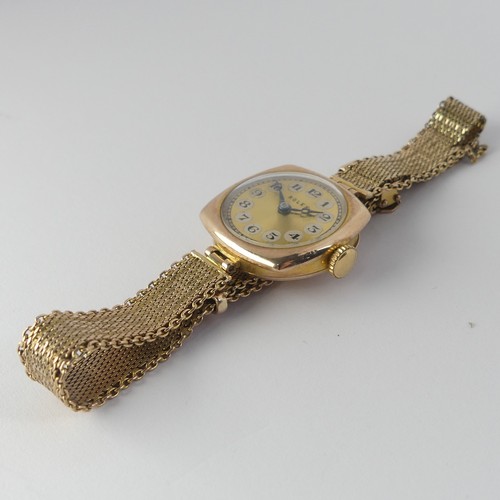 210 - A 1930's 9ct gold Rolex lady's Wristwatch, the signed gilt dial with Arabic Numerals, with a 15-jewe... 