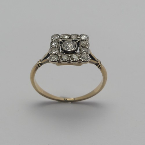 273 - A small Art Deco diamond cluster Ring, the squared front with central diamond within a surround of s... 