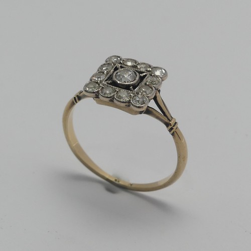 273 - A small Art Deco diamond cluster Ring, the squared front with central diamond within a surround of s... 