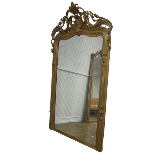 507 - A large 19th century French style gilt framed wall Mirror, the crest with central carved acanthus le... 