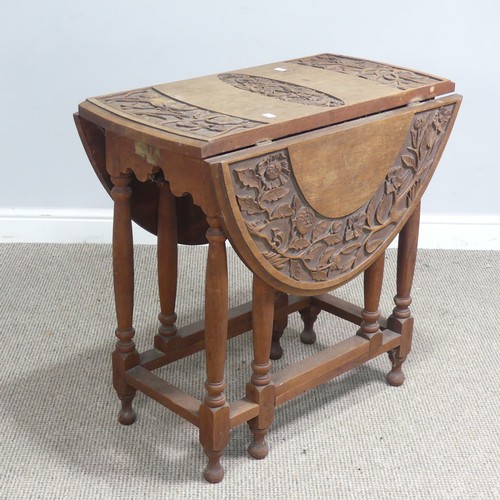 515 - An Anglo-Chinese style drop-leaf gate-leg Table, oval top with carved foliate border and central dra... 