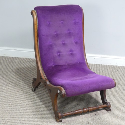 520 - An antique Regency style scroll mahogany Nursing Chair, with button-back purple upholstery, W 40 cm ... 