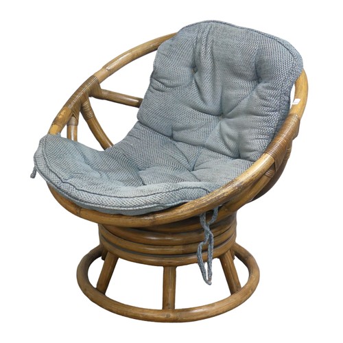 411 - A mid-20th century bentwood bamboo swivel Chair, with blue cushion, W 74.5 cm x H 71 cm x D 65 cm to... 