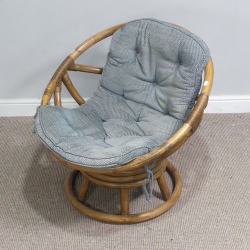 411 - A mid-20th century bentwood bamboo swivel Chair, with blue cushion, W 74.5 cm x H 71 cm x D 65 cm to... 