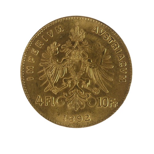 450 - An Austrian gold 4 Florins / 10 Francs Coin, 1892 re-strike.