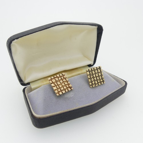 361 - A cased pair of 9ct yellow gold Cufflinks, hallmarked London, 1966, the textured chequerboard square... 