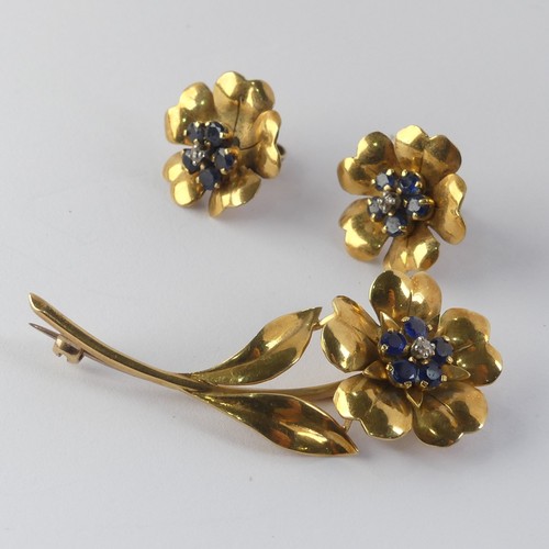 331 - A foliate Brooch and Earring suite, the flowerheads set with five sapphires and central diamond poin... 