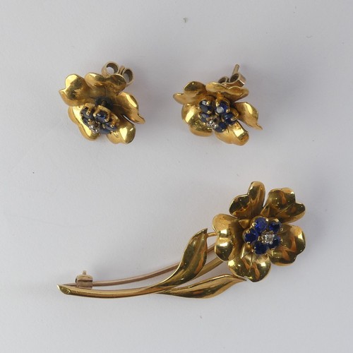 331 - A foliate Brooch and Earring suite, the flowerheads set with five sapphires and central diamond poin... 