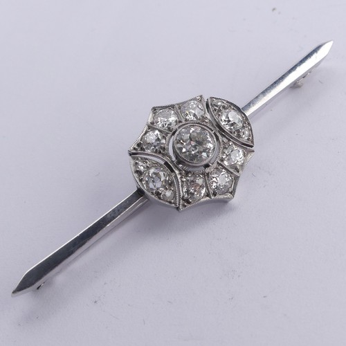 An Art Deco diamond cluster Bar Brooch, the old cut stones millegrain set in 15ct white gold, principle stone approx. 0.6ct, total diamond weight estimated at 1.6ct, cluster length 19mm, the bar 6cm long, total weight 8.3g.