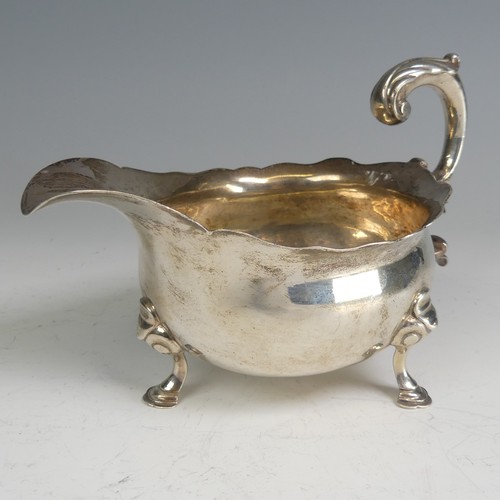 63 - A George II silver Sauce Boat, probably by Fuller White, hallmarked London 1755, of traditional form... 