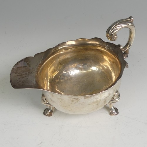 63 - A George II silver Sauce Boat, probably by Fuller White, hallmarked London 1755, of traditional form... 