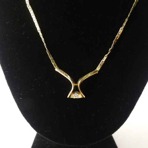 312 - A 9ct yellow gold Pendant, set small diamond point, on an integral chain with box clasp, 42cm long, ... 