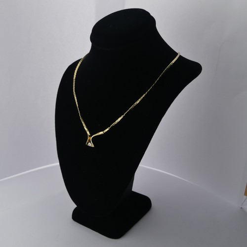 312 - A 9ct yellow gold Pendant, set small diamond point, on an integral chain with box clasp, 42cm long, ... 