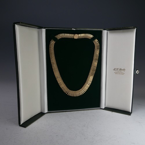 313 - A 9ct yellow gold fringe 'Cleopatra' Necklace, hallmarked Birmingham, 1967, the clasp with inscripti... 