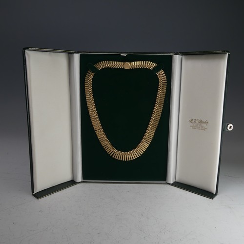 313 - A 9ct yellow gold fringe 'Cleopatra' Necklace, hallmarked Birmingham, 1967, the clasp with inscripti... 