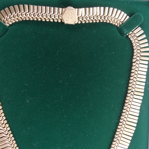 313 - A 9ct yellow gold fringe 'Cleopatra' Necklace, hallmarked Birmingham, 1967, the clasp with inscripti... 