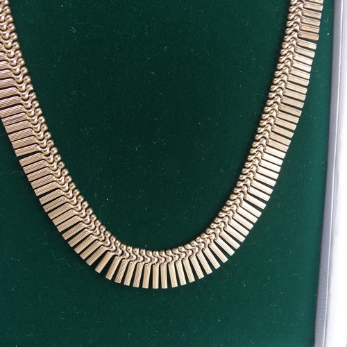 313 - A 9ct yellow gold fringe 'Cleopatra' Necklace, hallmarked Birmingham, 1967, the clasp with inscripti... 