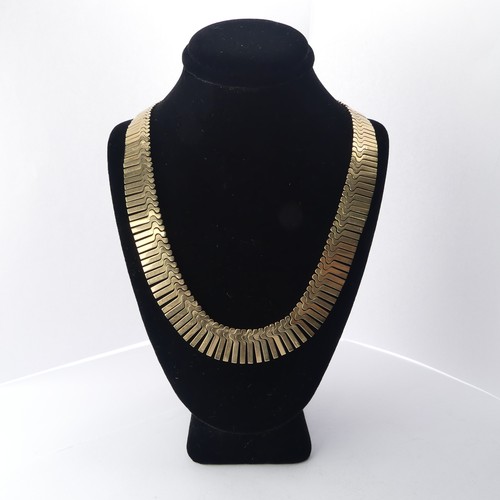 313 - A 9ct yellow gold fringe 'Cleopatra' Necklace, hallmarked Birmingham, 1967, the clasp with inscripti... 