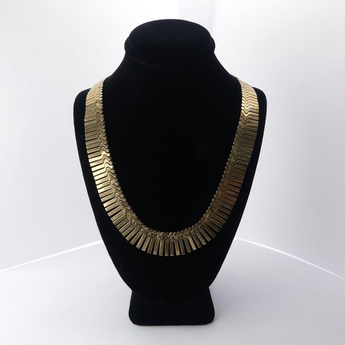 313 - A 9ct yellow gold fringe 'Cleopatra' Necklace, hallmarked Birmingham, 1967, the clasp with inscripti... 