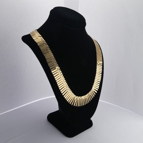 313 - A 9ct yellow gold fringe 'Cleopatra' Necklace, hallmarked Birmingham, 1967, the clasp with inscripti... 