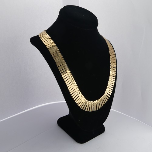 313 - A 9ct yellow gold fringe 'Cleopatra' Necklace, hallmarked Birmingham, 1967, the clasp with inscripti... 